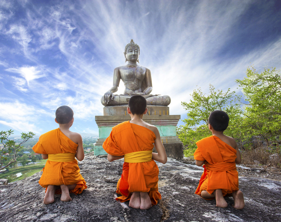 Photograph Novice Monk praying to the Buddha by Sasin Tipchai on 500px
