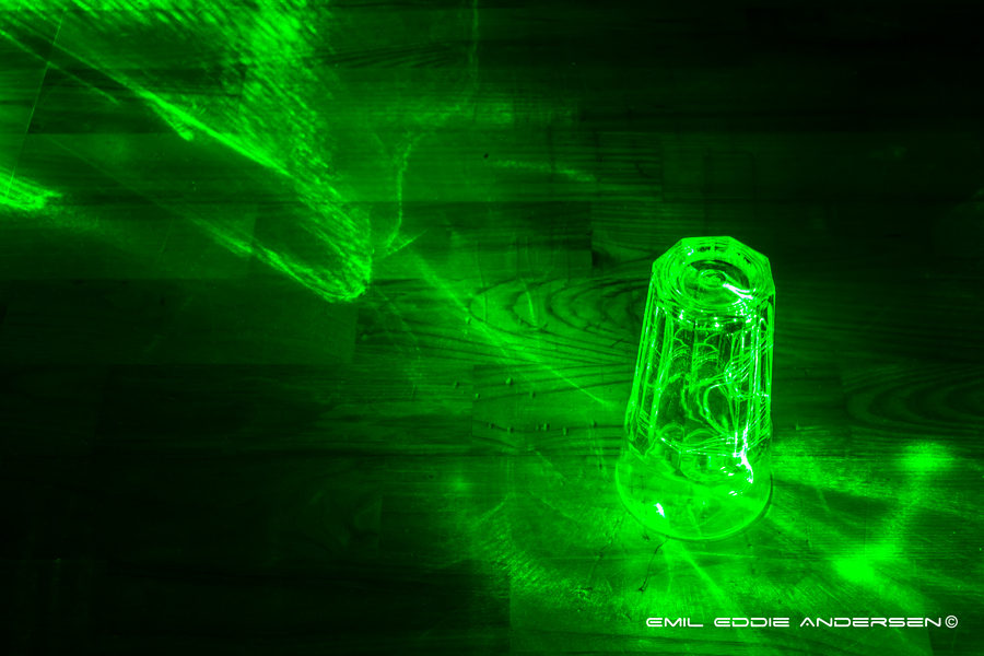Photograph Laser through a glass  by Emil Eddie Andersen on 500px