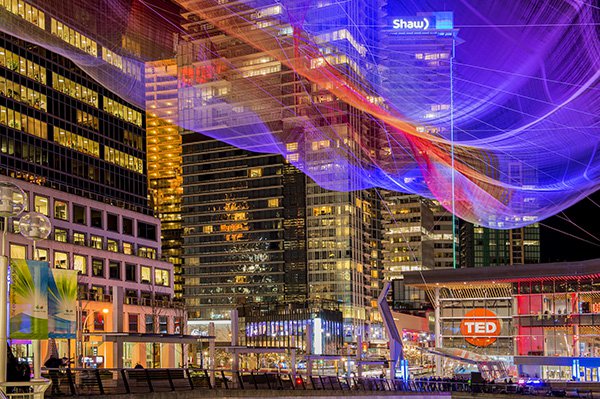 In a city scene, a deep depth of field is good as you want everything in focus.