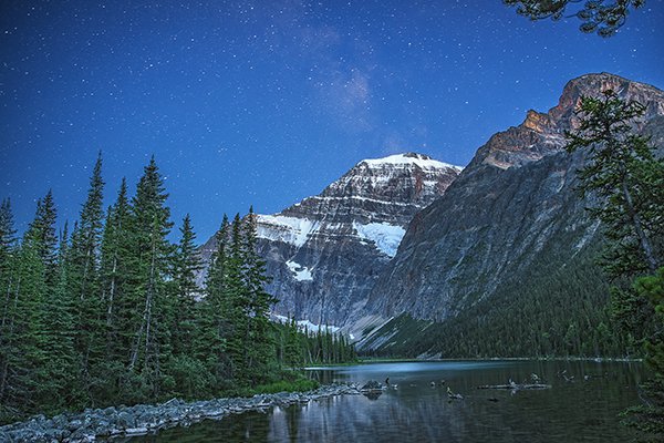 A blended shot, the foreground was shot earlier in the evening and the stars much later. This was blended in Photoshop afterwards