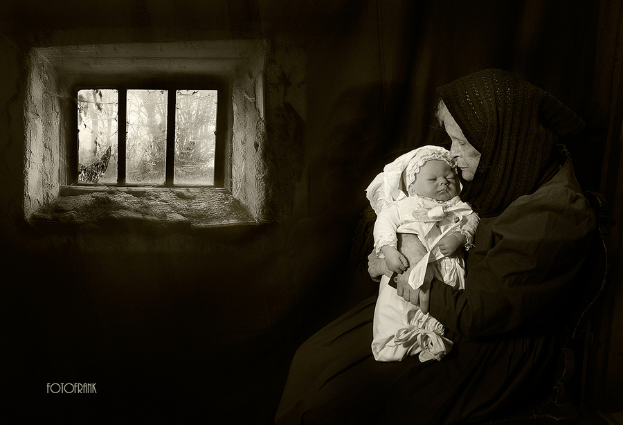Photograph Sad old woman with a baby doll by Johann Frank on 500px
