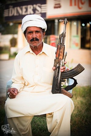 Sadeeq_Guard_With_Gun.jpg Sadeeq Guard With Gun