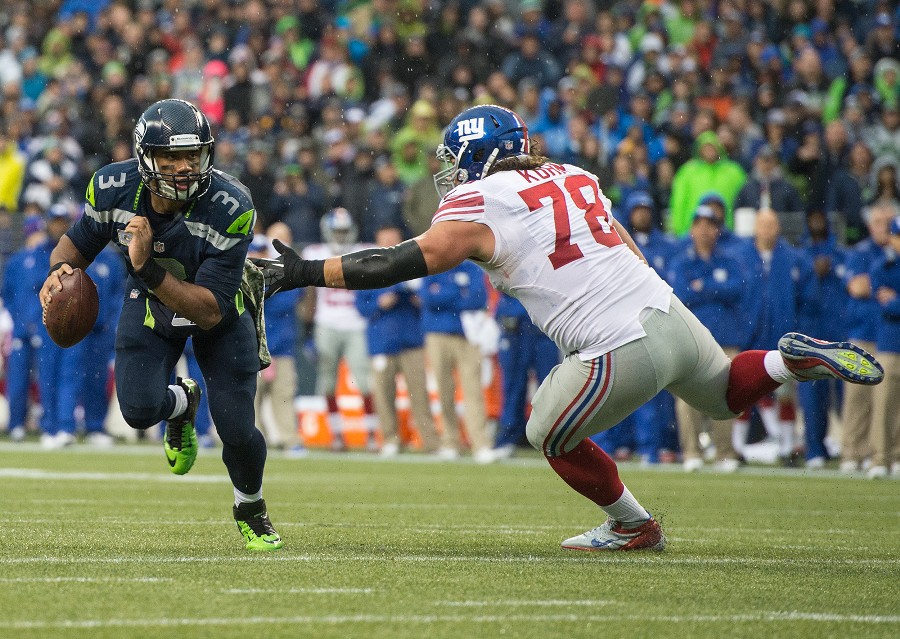 Photograph Seahawks Russell Wilson scambles by Matt McDonald on 500px