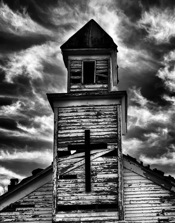 Using Ansel's previsionalization method, When approaching this image I immediately visualizied this image as a black and white by adding a polarzing filter I was able to make the blue sky more saturated which can in handing later during processing to create dark and contrasting sky. I also intentionally under-exposed the image to ensure that the white boards of the abandon church are not to bright, to help convey the abandon feeling of theimage.