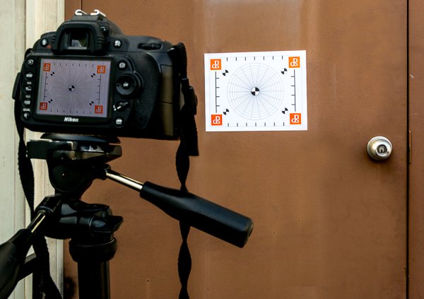 What's wrong with this picture?  The center post is extended and the camera strap is hanging loose