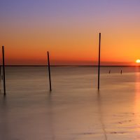 7 Uncommon Tips for Winter Sunrise Photos Near Water