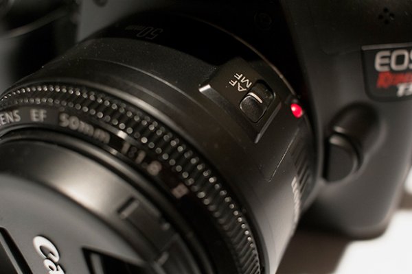 The AF-MF switch is located on the lens itself if compatible.