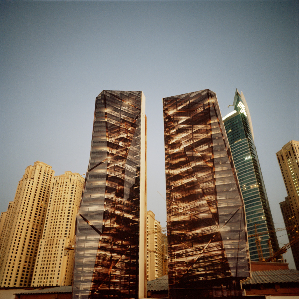U.A.E. Dubai. Images of new buildings on billboards at the Dubai Marina. 2013