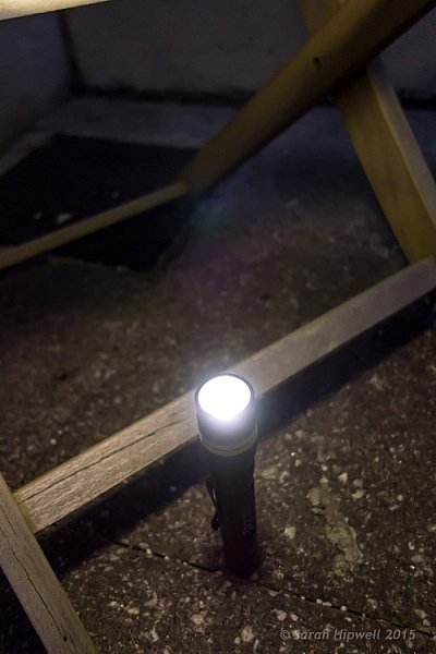 Torch-under-chair