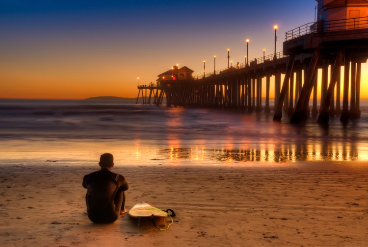 Final image, color correction made to bring out more of the color of the scene, Removed tire tracks in the sand and also dark spot that was coming out of the head of the surfer.