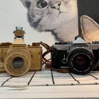 Vietnamese shop crafts brilliant wooden camera models with interchangeable lenses