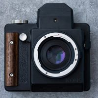 The NONS SL660 is an EF-mount interchangeable lens camera that uses Fujifilm Instax Square Film